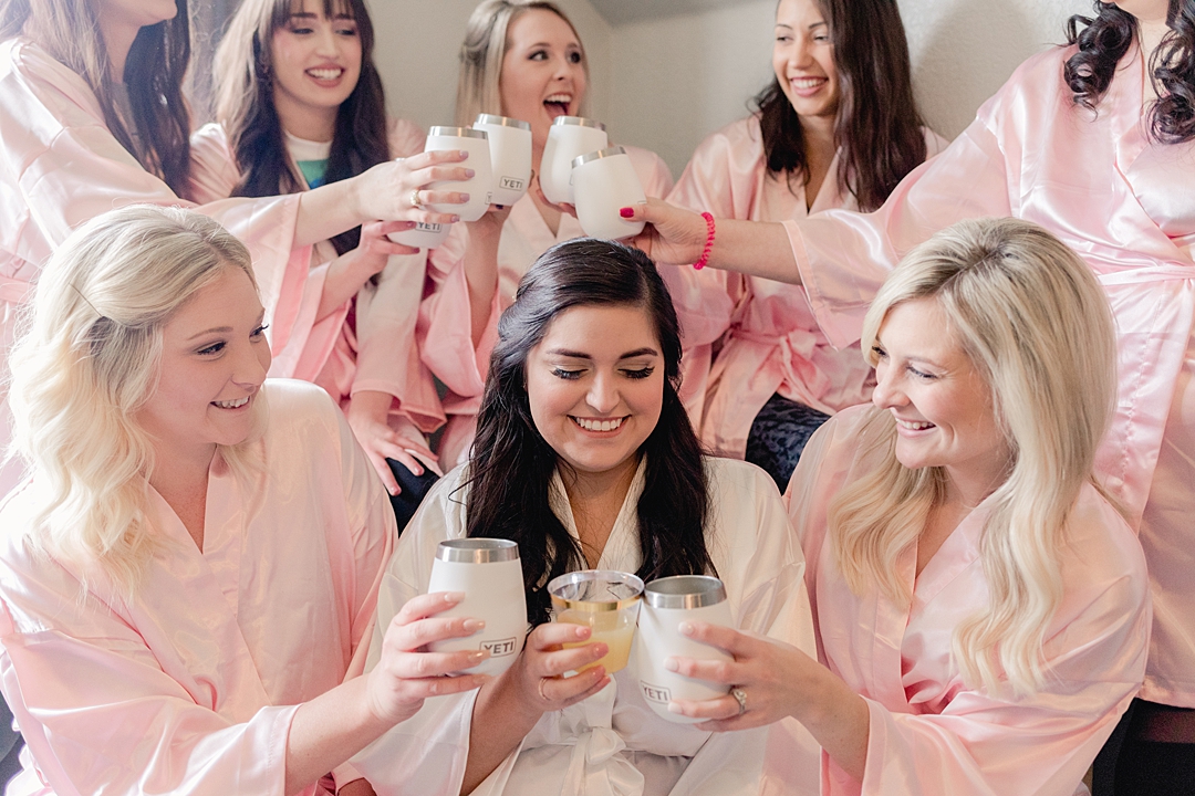 Pink robes for the getting ready shots! "Not to be cheesy, but everything just made sense.” This Vista West Ranch wedding features the sweetest love story!! Click through to read more!