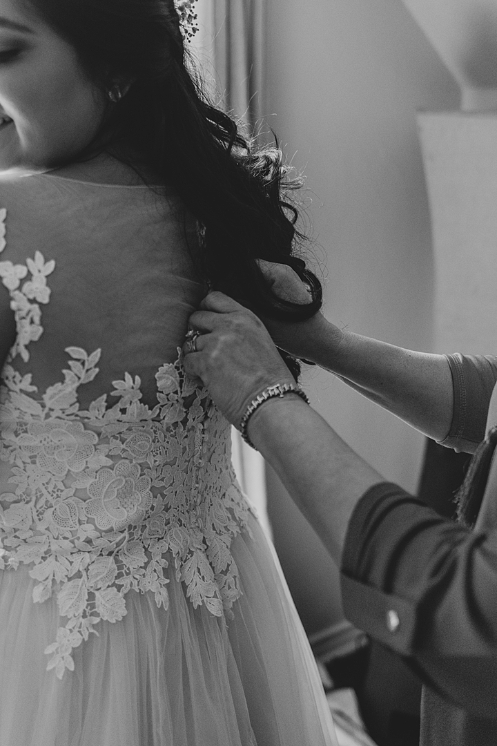 Black and white back of the dress, getting ready shot! "Not to be cheesy, but everything just made sense.” This Vista West Ranch wedding features the sweetest love story!! Click through to see more!