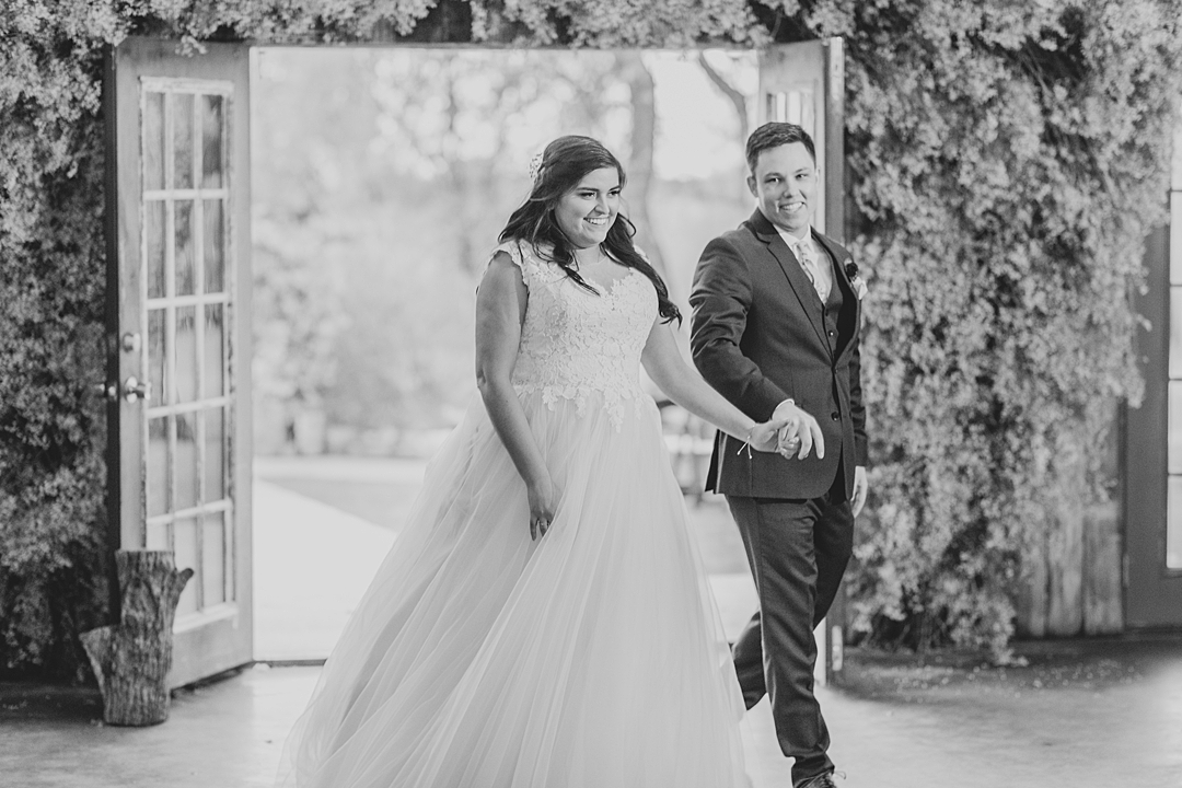 Newlywed entrance! "Not to be cheesy, but everything just made sense.” This Vista West Ranch wedding features the sweetest love story!! Click through to read more!