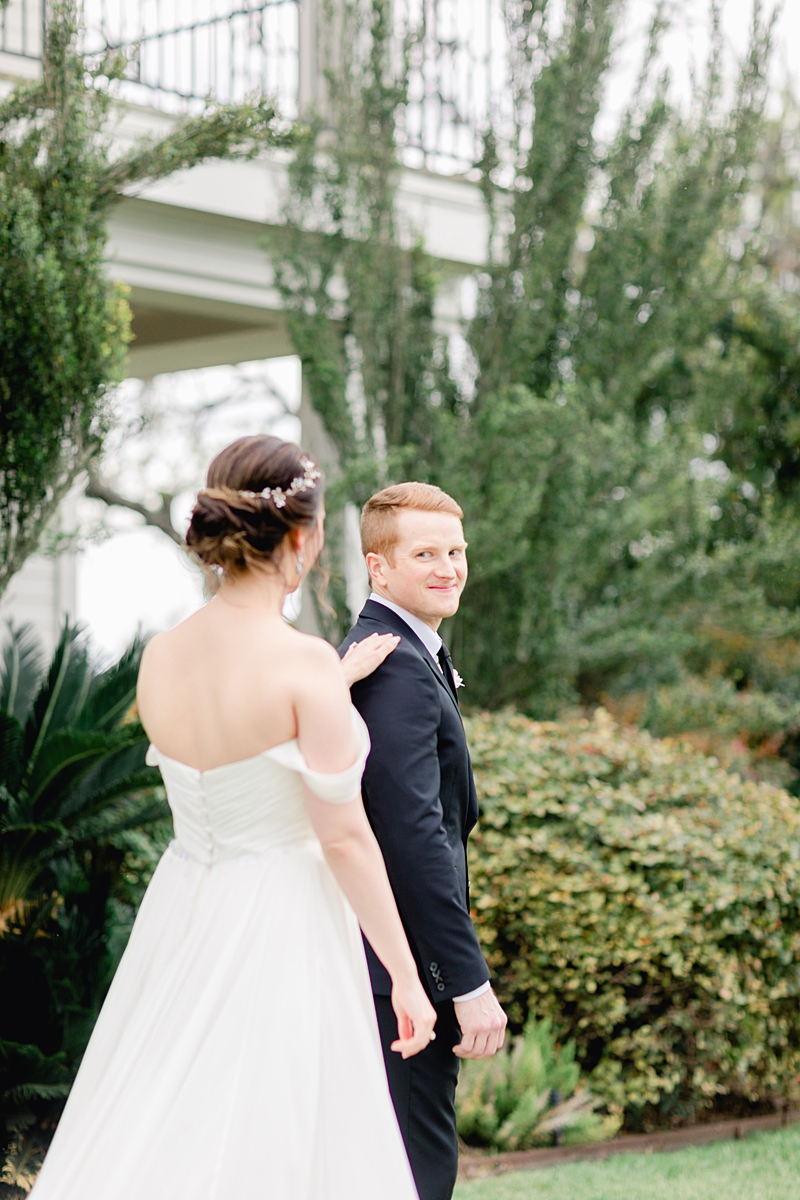 The first look moment! An elegant Springtime Antebellum Oaks wedding in Austin, Texas is what dreams are made of! Navy and blush accents, cookie cakes, and more!