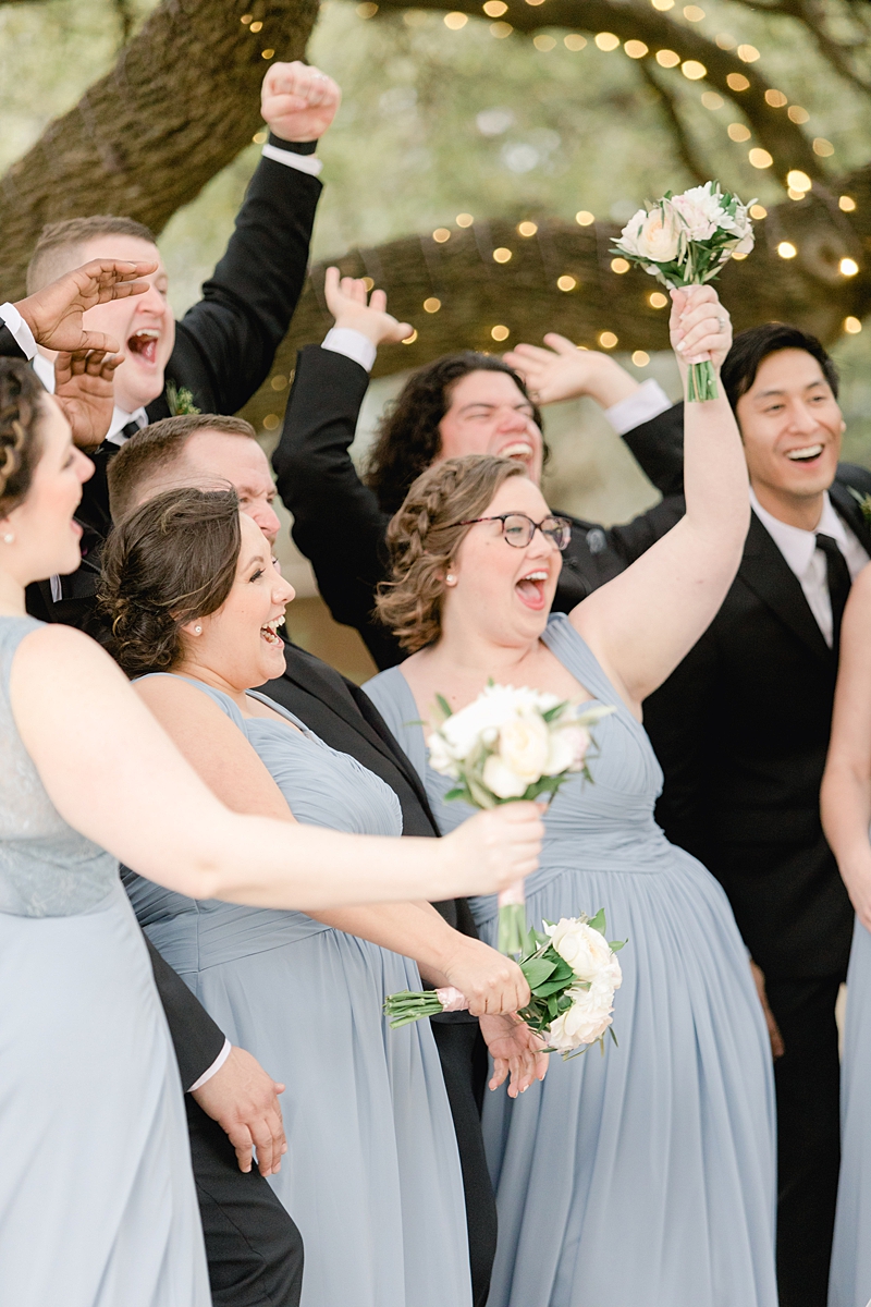 Classic bridesmads in Dusty Blue Azazie.com dresses and groomsmen in Indochino! An elegant Springtime Antebellum Oaks wedding in Austin, Texas is what dreams are made of! Navy and blush accents, cookie cakes, and more!