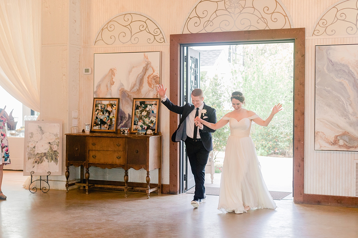 Newlywed entrance and first dance! An elegant Springtime Antebellum Oaks wedding in Austin, Texas is what dreams are made of! Navy and blush accents, cookie cakes, and more!