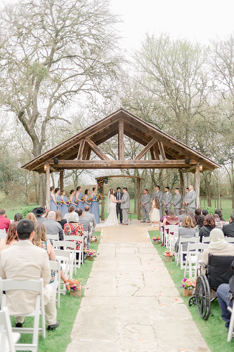 So what do you do when your wedding falls on Texas Independence Day? If you thought, duh, decorate it with all the beautiful and familiar Texas wildflower that pop up every spring! You and Meg are definitely on the same page!! When she told us about her vision when we met about a year go, I was so excited to see her vision come into place. She described it as colorful, magical, and a memory I will cherish forever. Needless to say, those florals and that vision delivered!