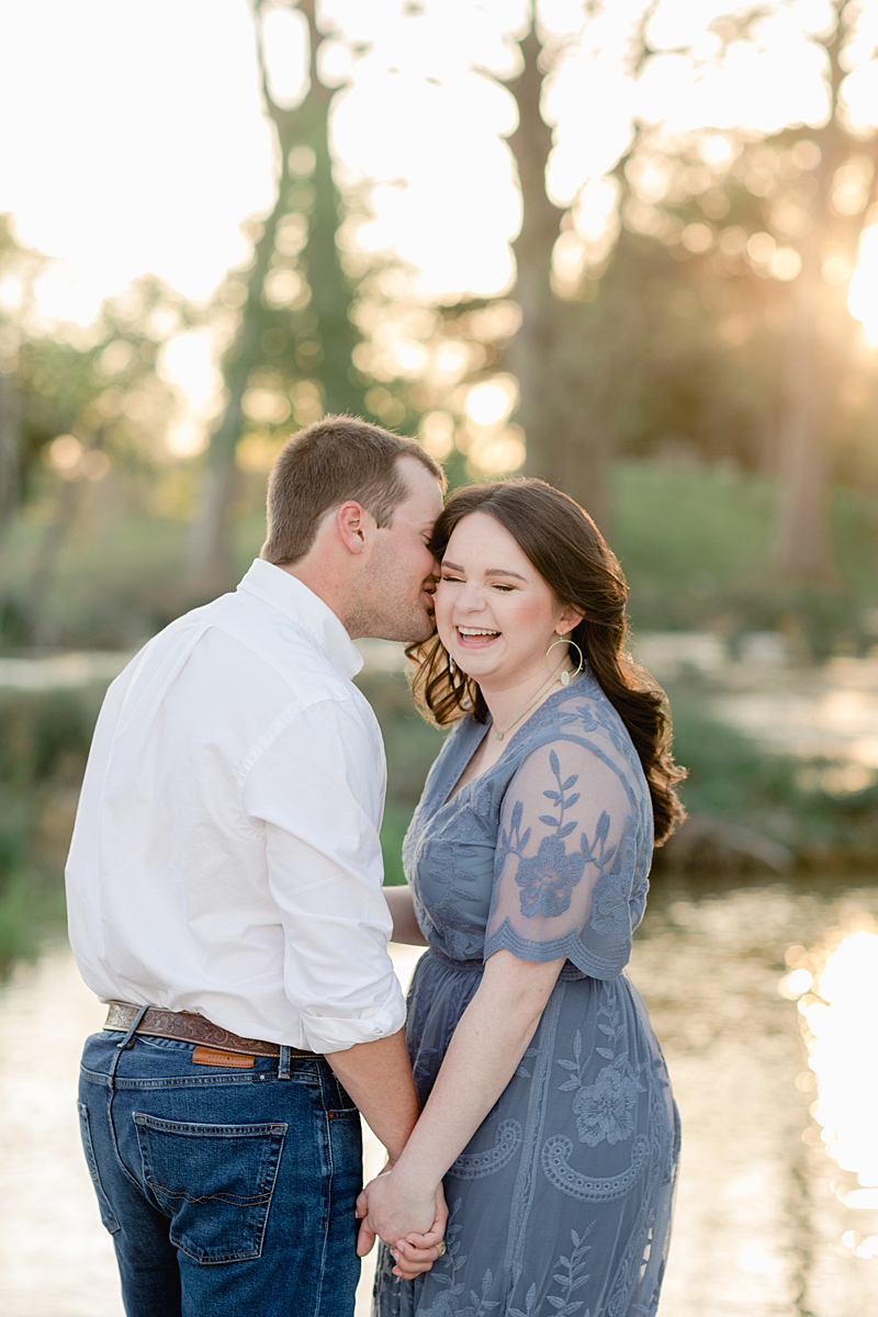 Chelsea & Drew's engagement session at The Waters Point was so dreamy! They hopped right into the river! I love her navy blue embroidered dress. Outfit Inspiration for sure!