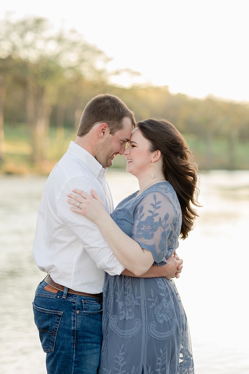 Chelsea & Drew's engagement session at The Waters Point was so dreamy! They hopped right into the river! I love her navy blue embroidered dress. Outfit Inspiration for sure!