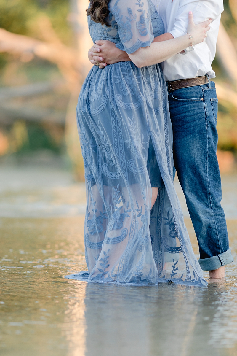 Chelsea & Drew's engagement session at The Waters Point was so dreamy! They hopped right into the river! I love her navy blue embroidered dress. Outfit Inspiration for sure!