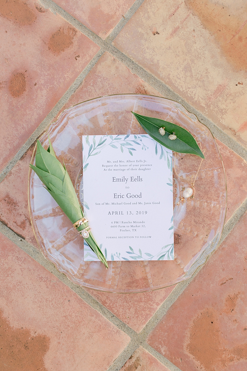 Invitation details on a tiled floor, Austin Texas wedding photographer. Click through to see all the beautiful details from this wedding!