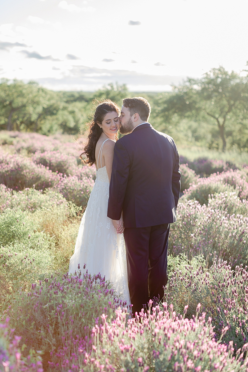 Husband and wife portraits in the lavender fields, at Rancho Mirando, Austin Texas wedding photographer. Click through to see all the beautiful details from this wedding!