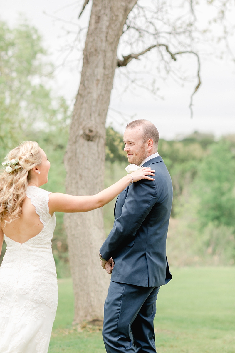 The first look moment!! So many handpicked, thoughtful details here in and around this wedding in Dripping Springs, Texas. Click through to see the most perfect wedding day!