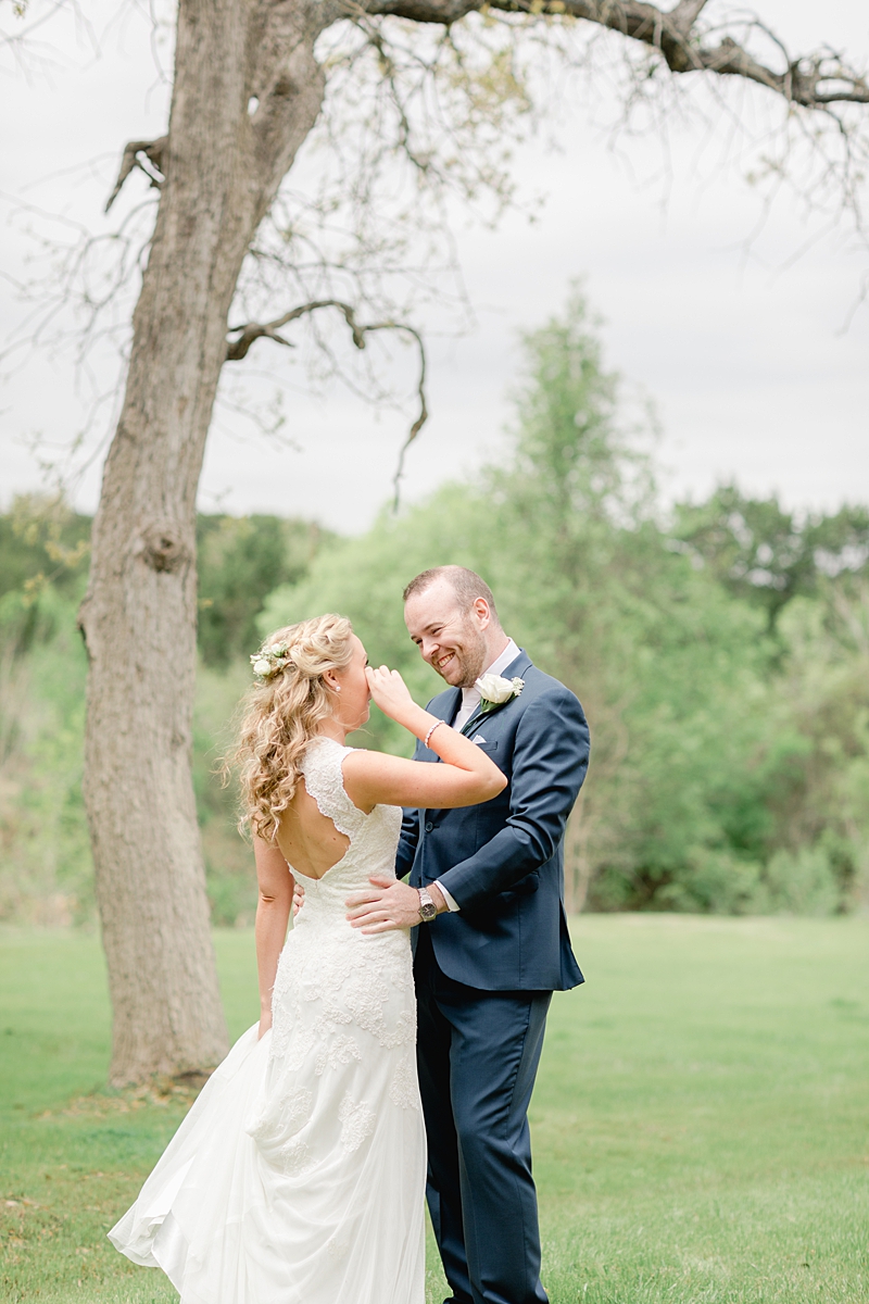 The first look moment!! So many handpicked, thoughtful details here in and around this wedding in Dripping Springs, Texas. Click through to see the most perfect wedding day!