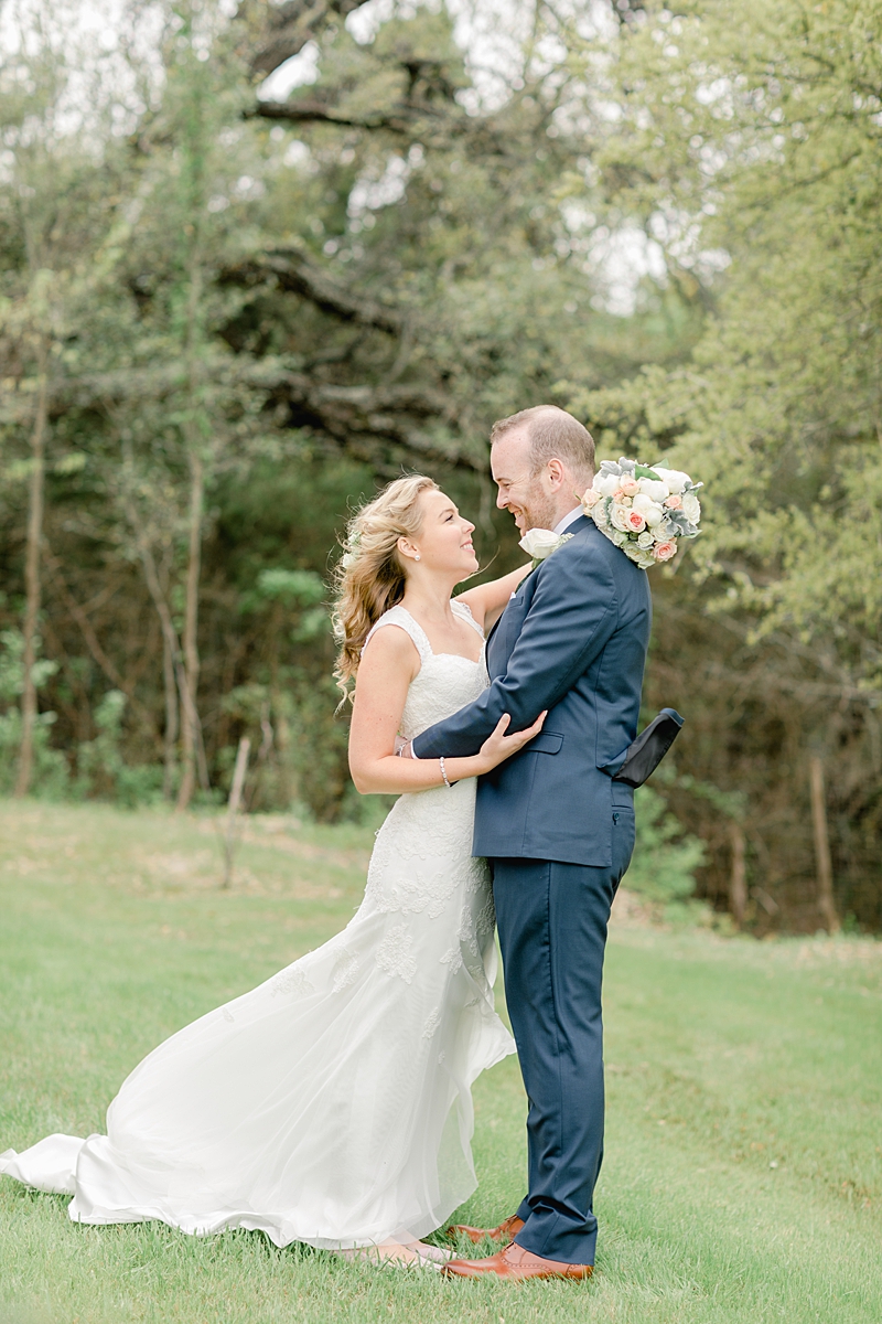 The first look moment!! So many handpicked, thoughtful details here in and around this wedding in Dripping Springs, Texas. Click through to see the most perfect wedding day!