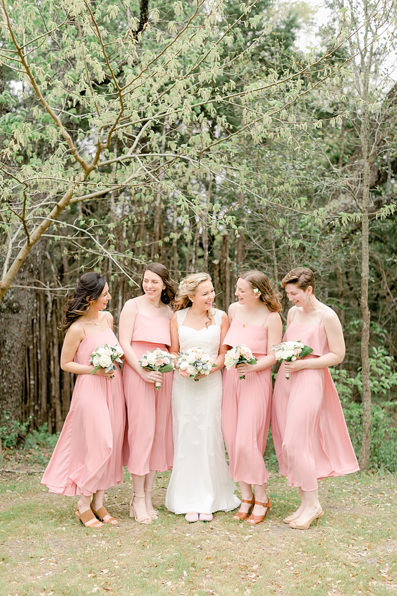 The bridal party used Rent the Runway for the bridesmaids dresses and Generation Tux! So many handpicked, thoughtful details here in and around this wedding in Dripping Springs, Texas. Click through to see the most perfect wedding day!