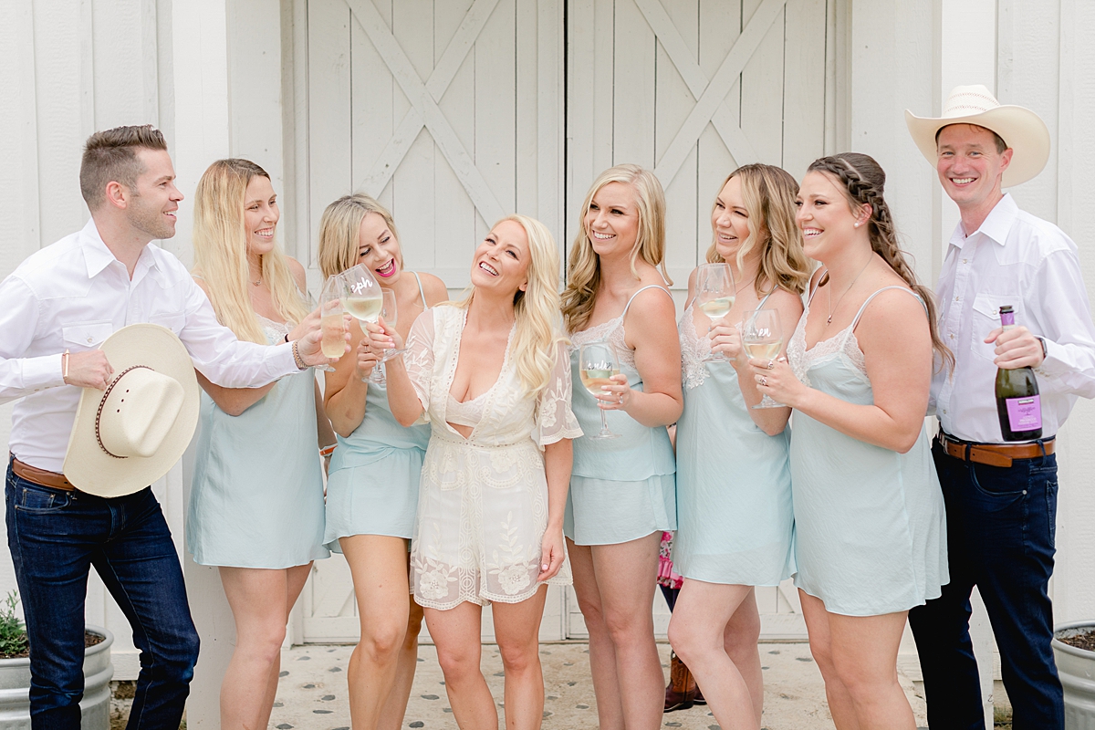 This beautiful summertime wedding at The Alexander at Creek Road features a beautiful ourdoor reception and ceremony under a huge oak tree.