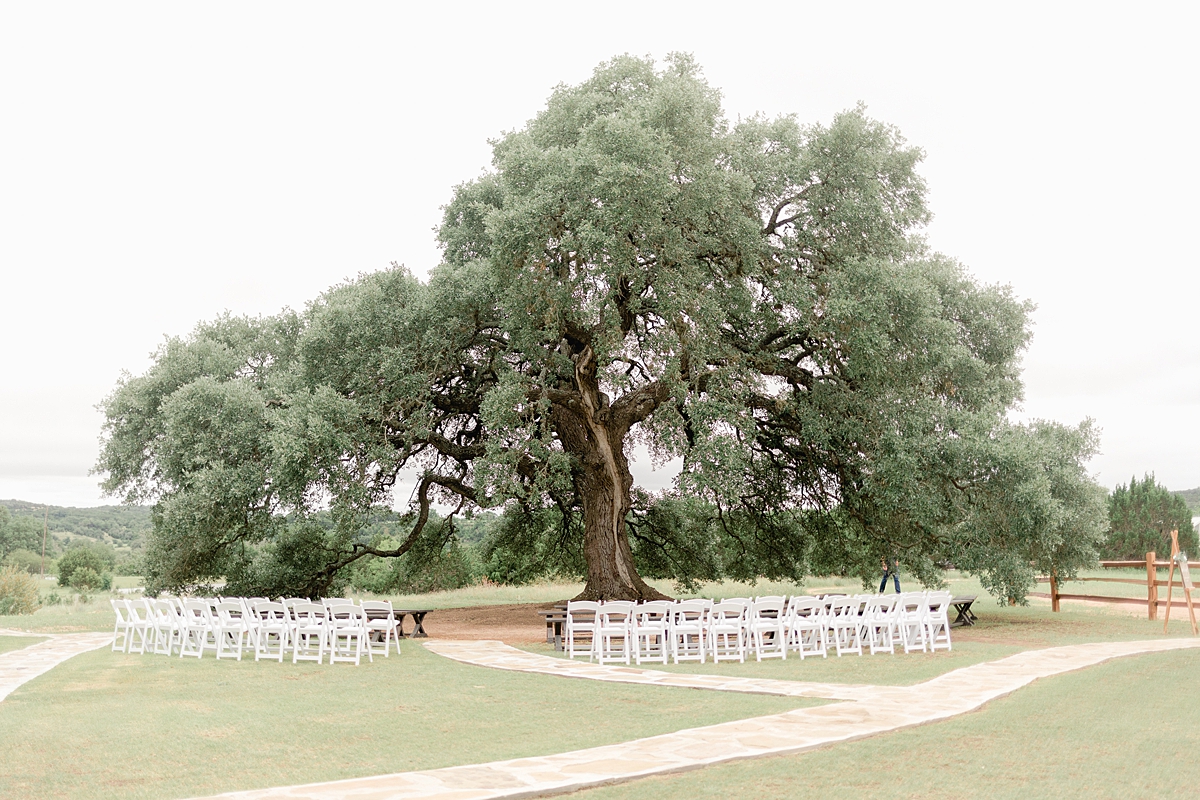 This beautiful summertime wedding at The Alexander at Creek Road features a beautiful ourdoor reception and ceremony under a huge oak tree.