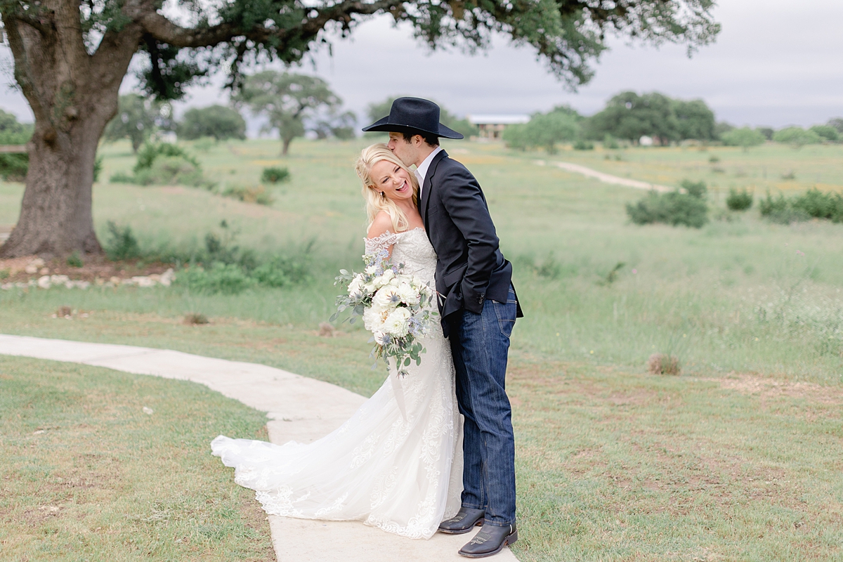 Husband and wife portraits during sunset! This beautiful summertime wedding at The Alexander at Creek Road features a beautiful ourdoor reception and ceremony under a huge oak tree.