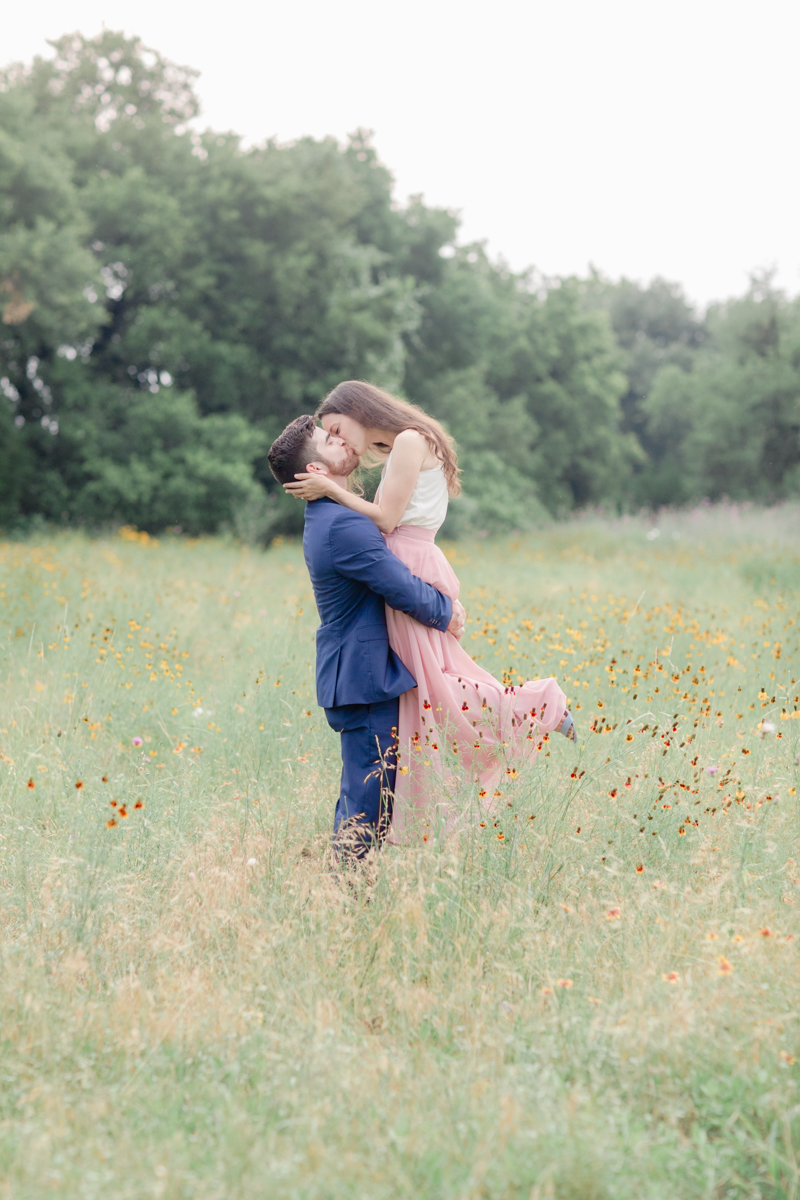 ALT TEXT: Sometimes a couple's energy is just so contagious. That’s Sebastian and Amber-Lea. They're the epitome of bubbly. Their Camp Lucy engagement session was so fun and beautiful! Plus there were ALPACAS! Click through to see their whole session!