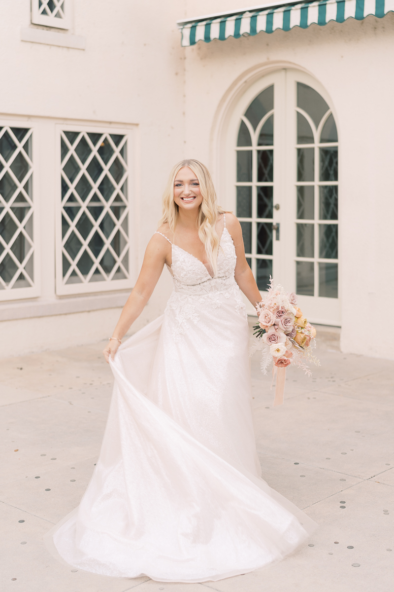 This bridal session at Laguna Gloria is the perfect classic, romantic bridals! With florals from Remi + Gold and the most sparkly, glitter wedding dress! 