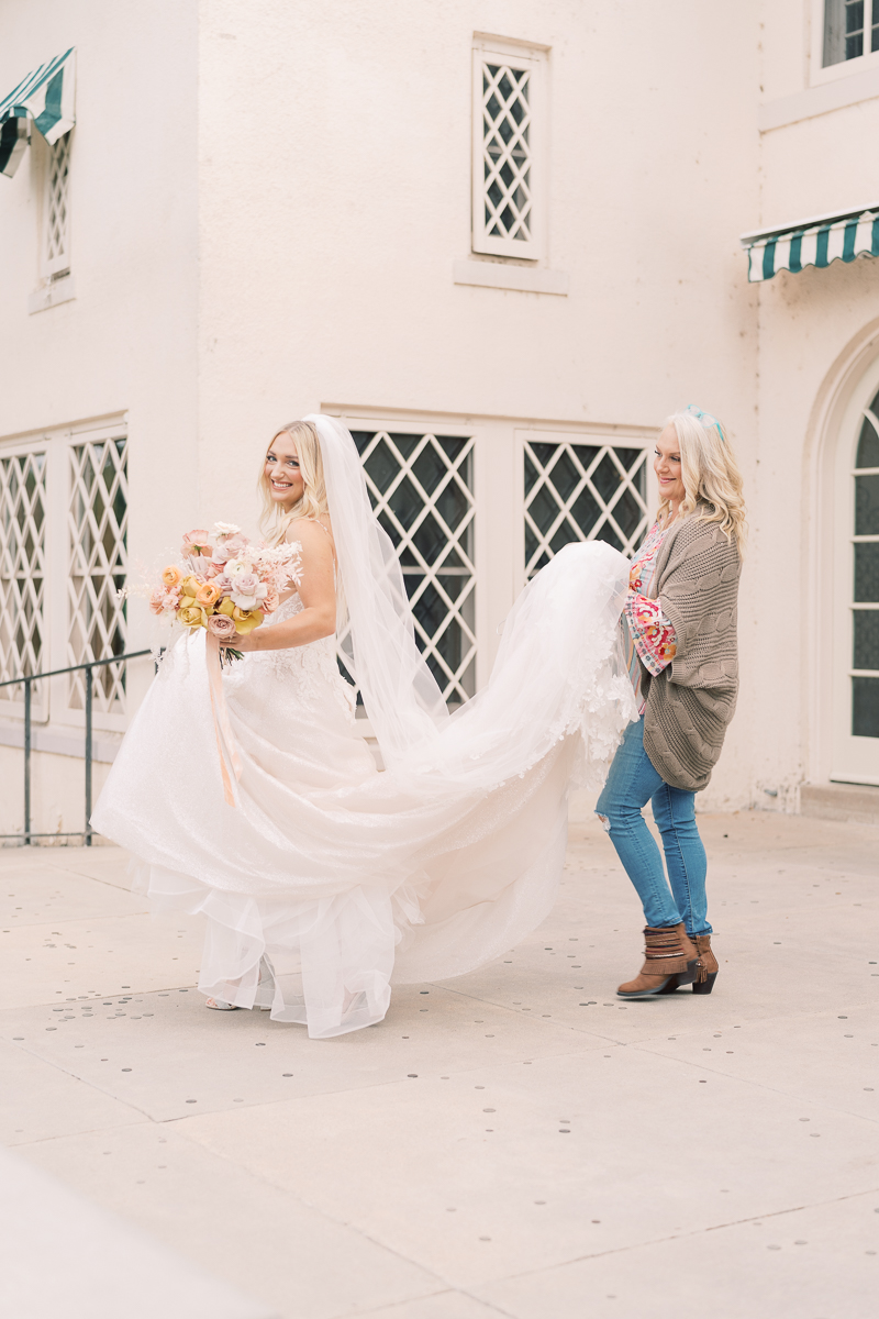 This bridal session at Laguna Gloria is the perfect classic, romantic bridals! With florals from Remi + Gold and the most sparkly, glitter wedding dress! 