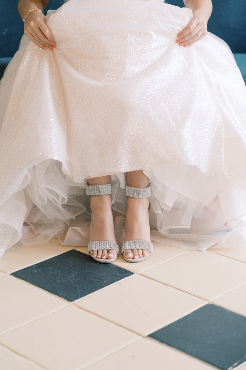 This bridal session at Laguna Gloria is the perfect classic, romantic bridals! With florals from Remi + Gold and the most sparkly, glitter wedding dress! 