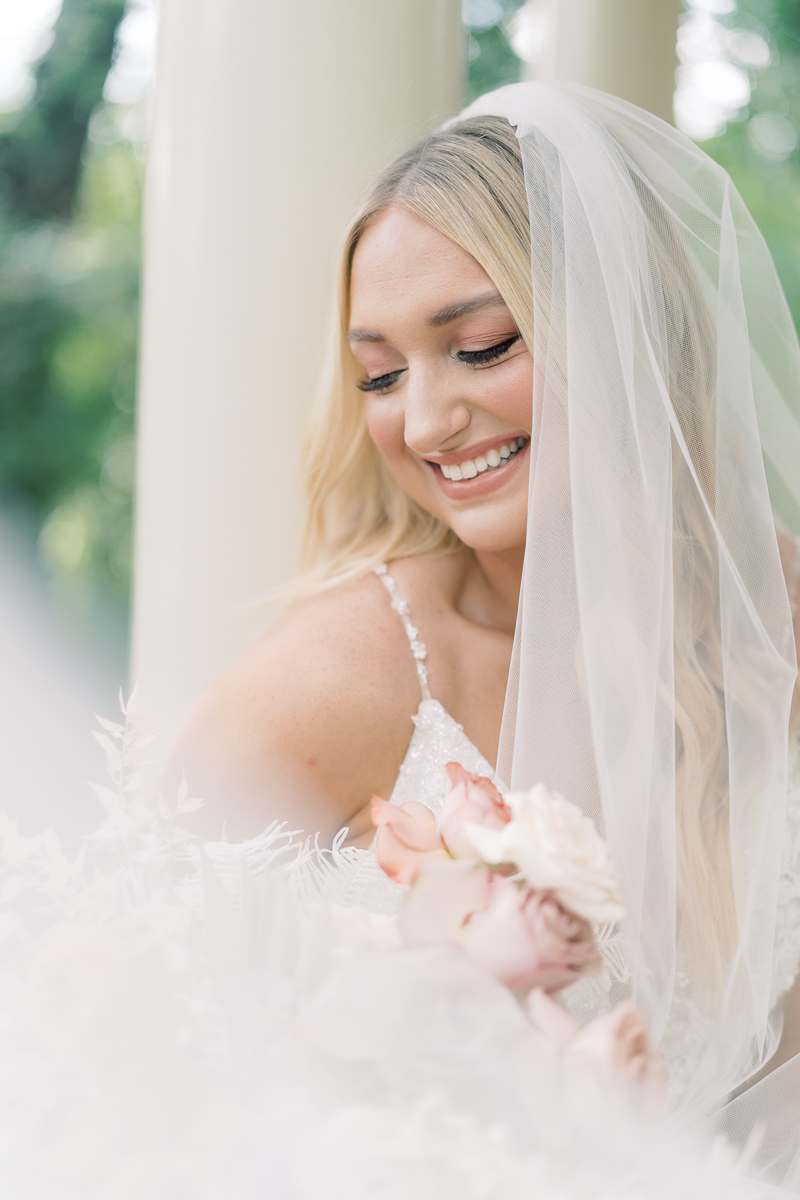 This bridal session at Laguna Gloria is the perfect classic, romantic bridals! With florals from Remi + Gold and the most sparkly, glitter wedding dress! 