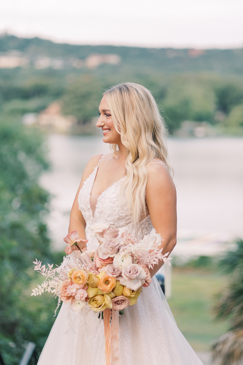 This bridal session at Laguna Gloria is the perfect classic, romantic bridals! With florals from Remi + Gold and the most sparkly, glitter wedding dress! 