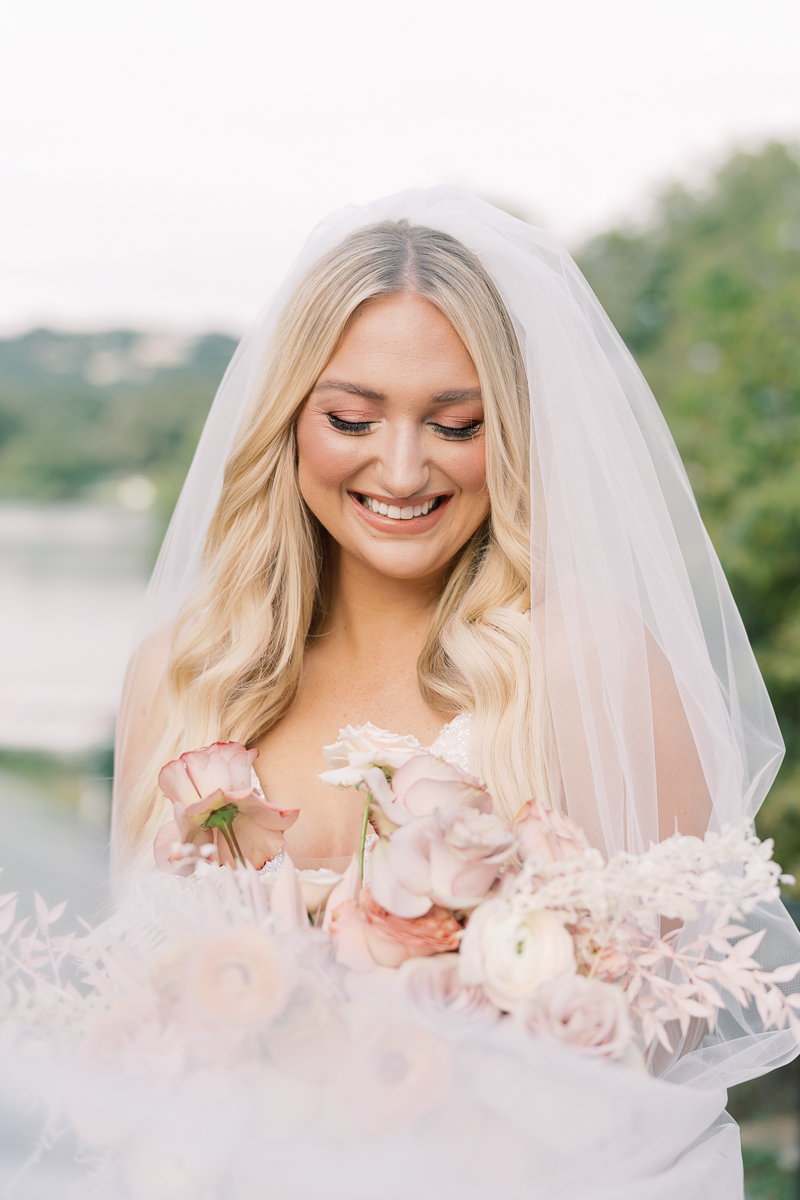 This bridal session at Laguna Gloria is the perfect classic, romantic bridals! With florals from Remi + Gold and the most sparkly, glitter wedding dress! 