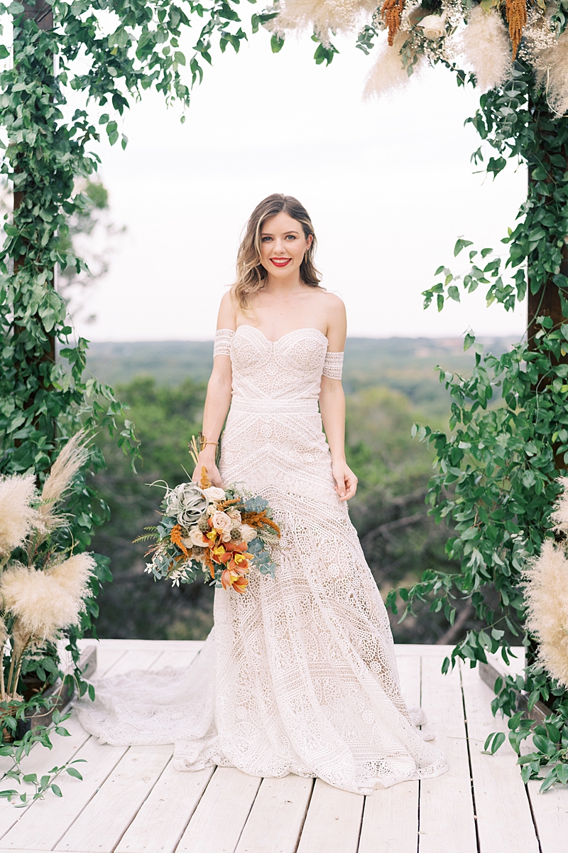 Dress from Unbridaled Austin, florals by Wish and Whimsy Floral: Fall wedding inspiration for the Texas Hill Country, with a fall color pallet too. Lucky Arrow Retreat is the coolest venue in Dripping Springs, TX!