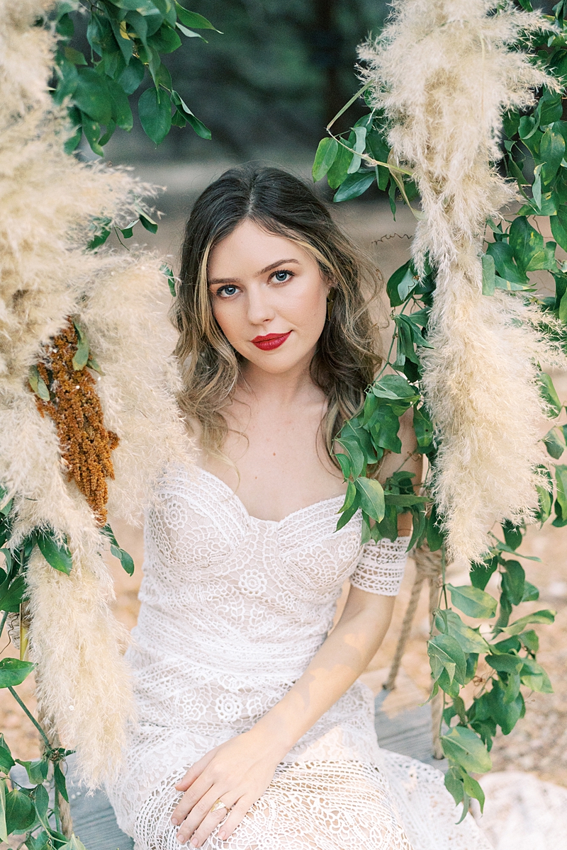 Dress from Unbridaled Austin, jewelry by On a Limb Creative, florals by Wish and Whimsy Floral: Fall wedding inspiration for the Texas Hill Country, with a fall color pallet too. Lucky Arrow Retreat is the coolest venue in Dripping Springs, TX!