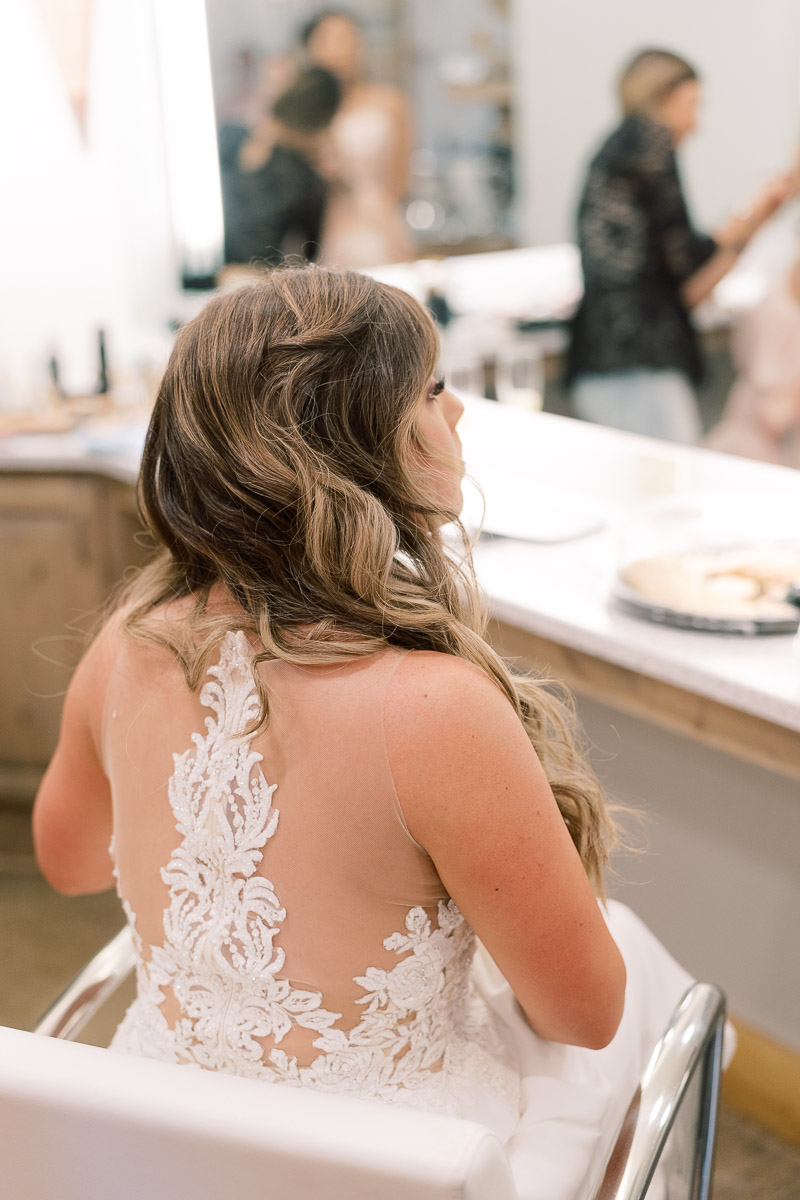 Just the bride getting ready...This Camp Lucy Sacred Oaks wedding was one for the books! Beautiful Texas weather, beer donkeys, what more could you ask for? You have to see it!