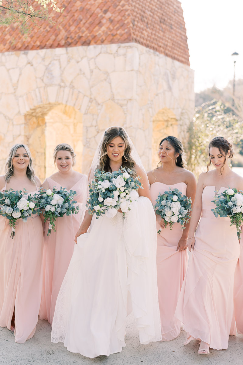 These blush bridesmaid dresses were perfect! This Camp Lucy Sacred Oaks wedding was one for the books! Beautiful Texas weather, beer donkeys, what more could you ask for? You have to see it!