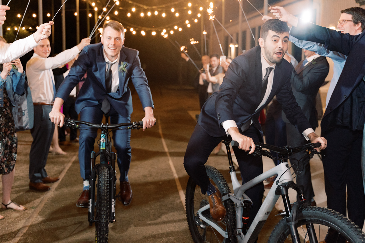 Mountain biking sparkler send off! Nick and Alex’s intimate Springdale Station wedding was one of our most touching and beautiful to date! They are the most handsome set of grooms and so fun!