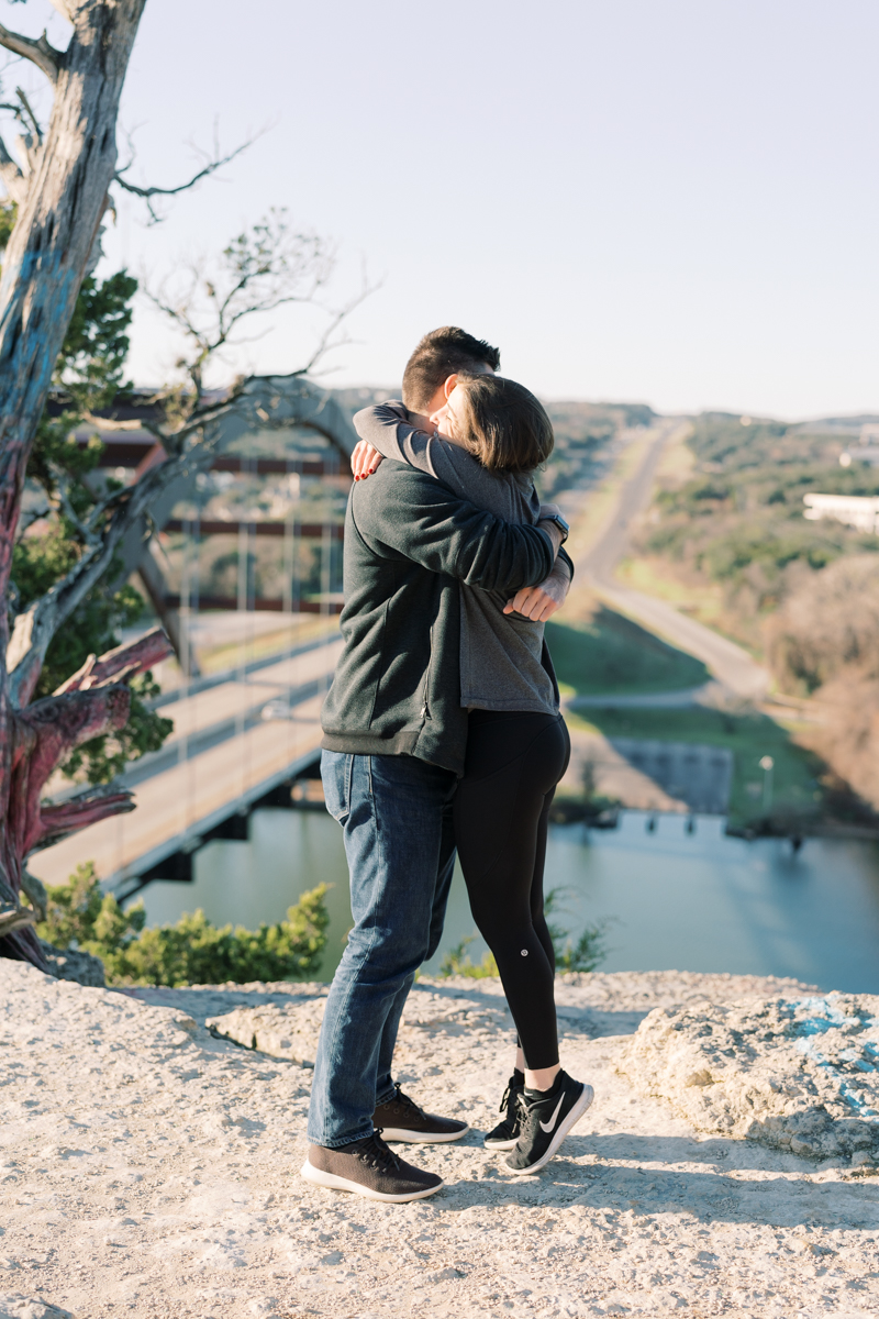 Lance proposed at the 360 Overlook in Austin, Texas, with town lake behind them and the 360 bridge! Click through to read their proposal story! 
