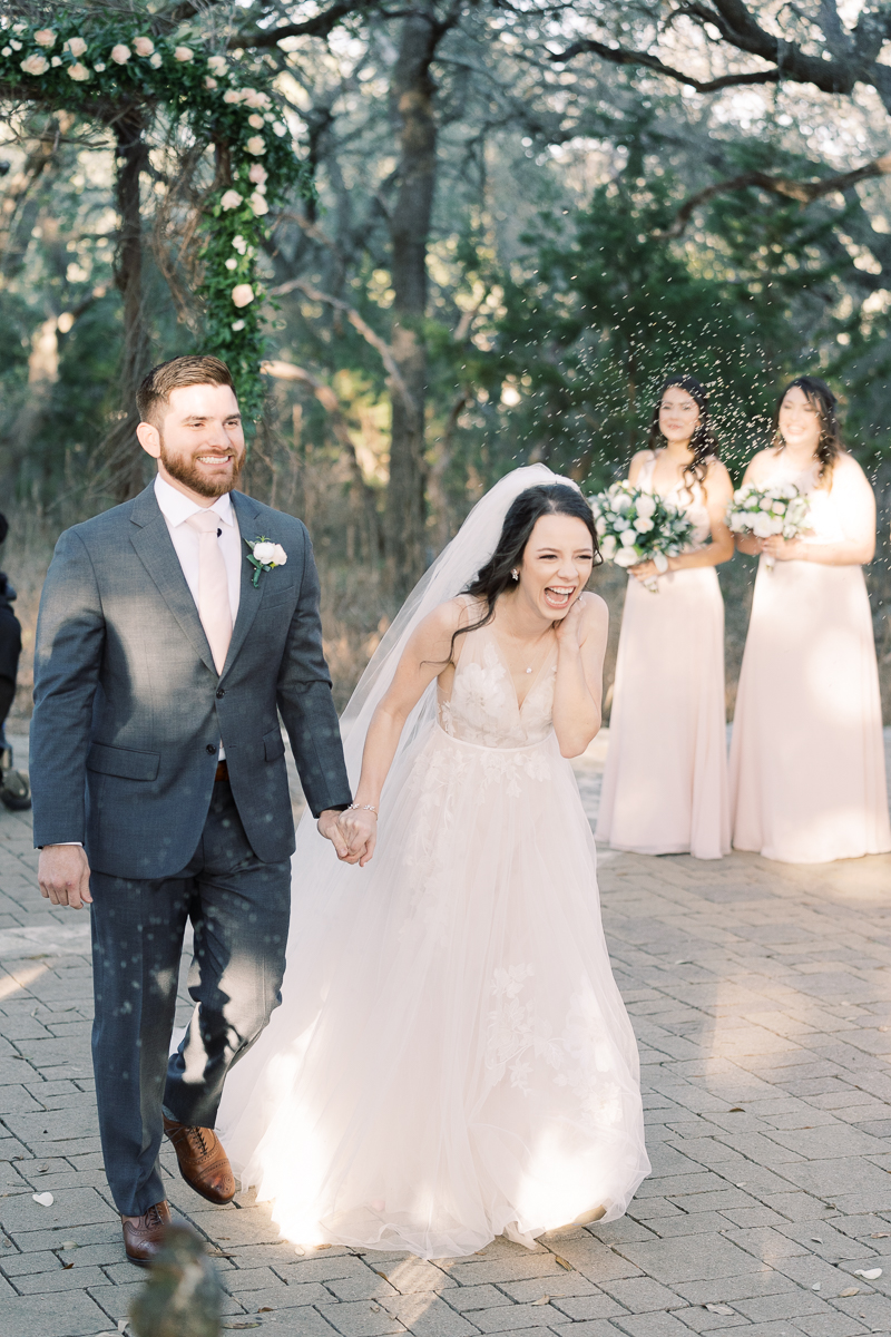 This blush and eucalyptus wedding at Camp Lucy is defined by two things: SO MANY Office references for the die hard fans, and the cutest couple in town!