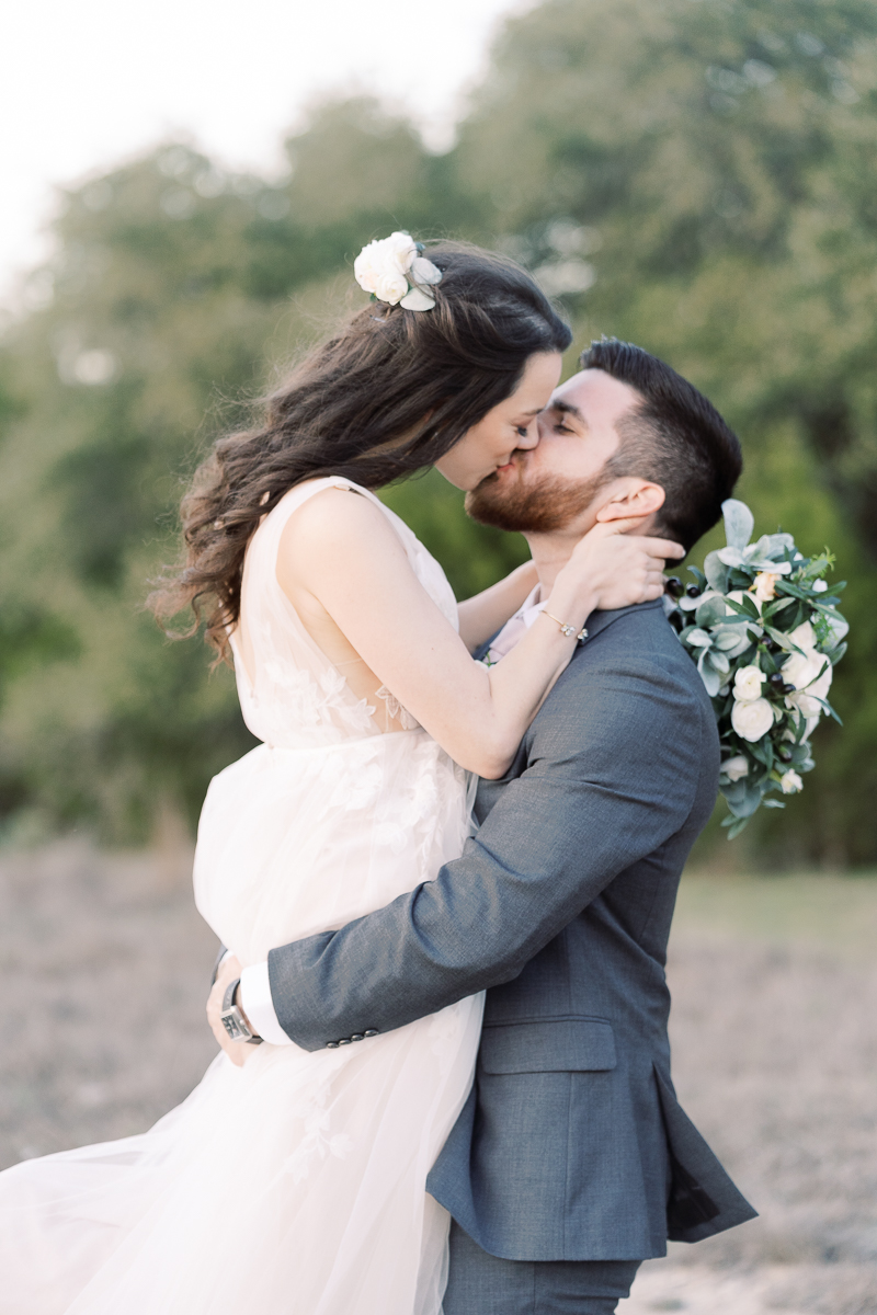 This blush and eucalyptus wedding at Camp Lucy is defined by two things: SO MANY Office references for the die hard fans, and the cutest couple in town!