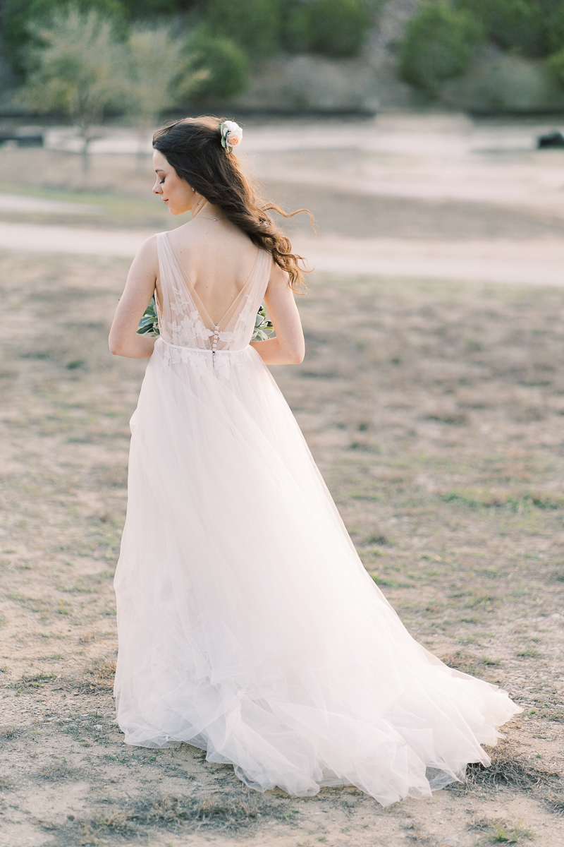 This blush and eucalyptus wedding at Camp Lucy is defined by two things: SO MANY Office references for the die hard fans, and the cutest couple in town!