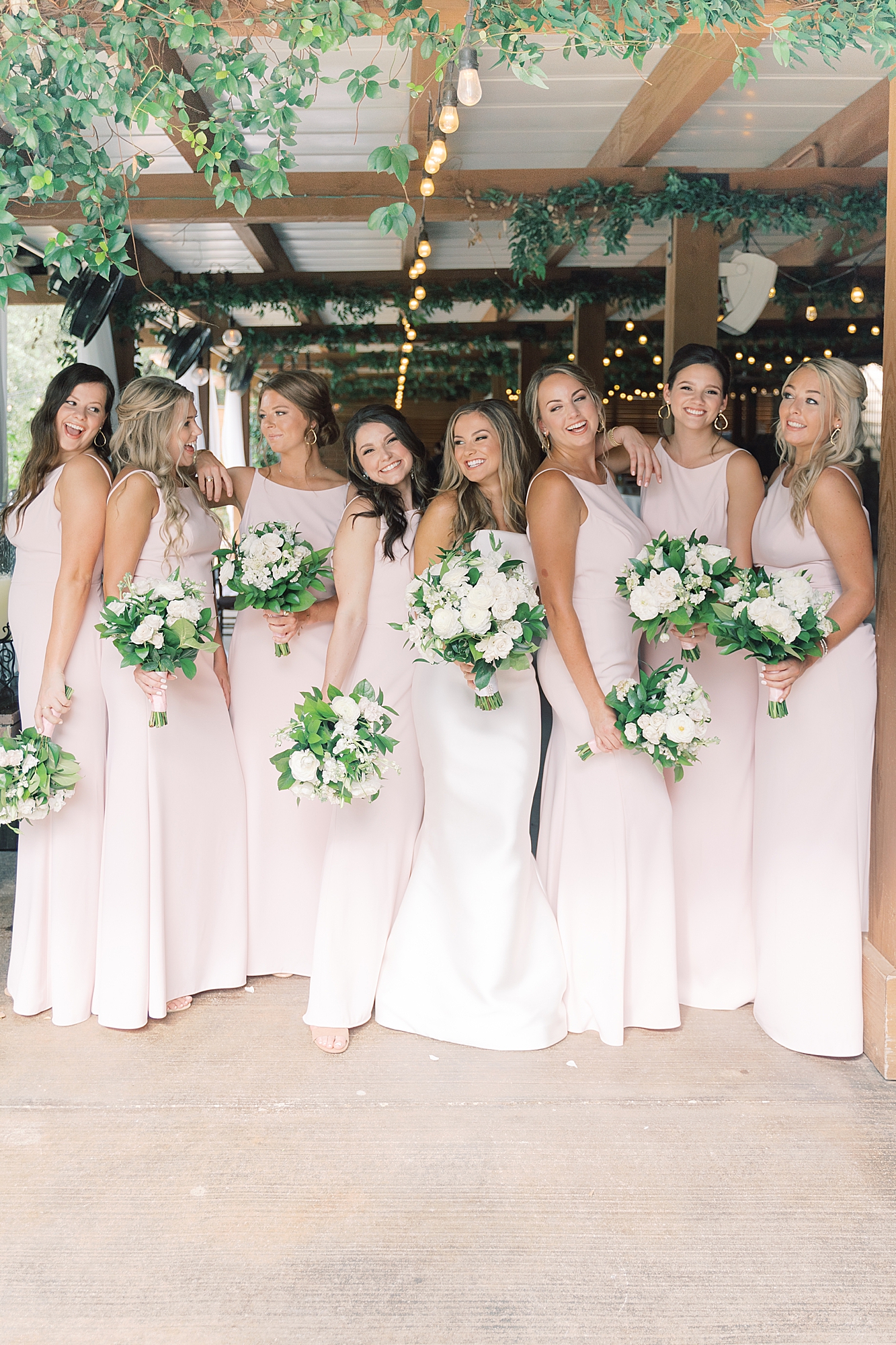 This classic Ma Maison wedding in Dripping Springs was perfection! Their ceremony was inside the brand new cathedral at Ma Maison. A string trio played, and the grooms' father officiated. Click through to see all the beautiful photos from their day! (p.s. you have to see the bride's dress!) 