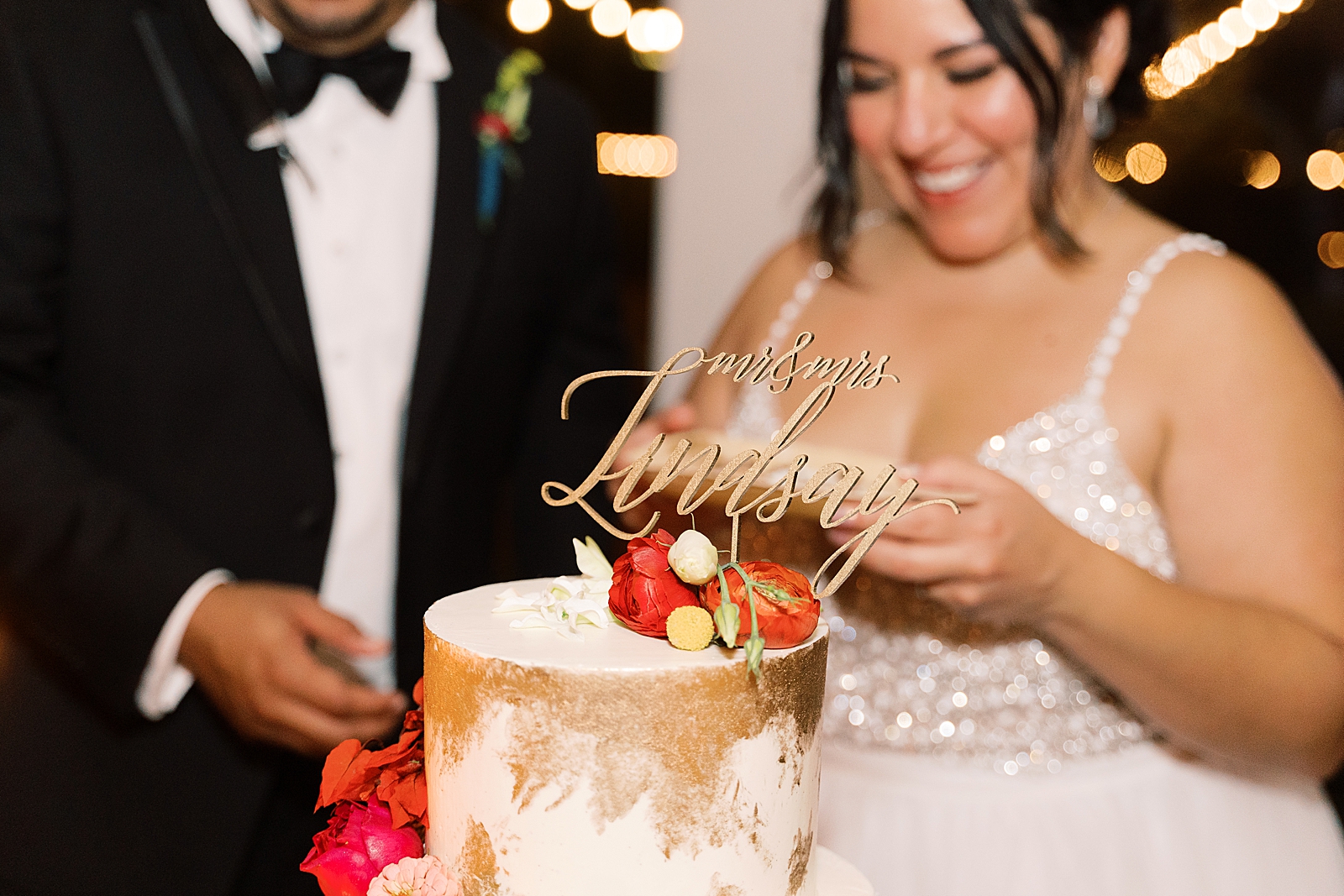 This love filled day at Springdale Station wedding had a surprise mariachi band and gorgeous details, designed by XO Moreau Events! You HAVE to see the bride's reception outfit! It's sparkly, tulle, and so fun! Click through to see this beautiful colorful Austin, TX wedding! #colorfulwedding #austinwedding #atxwedding