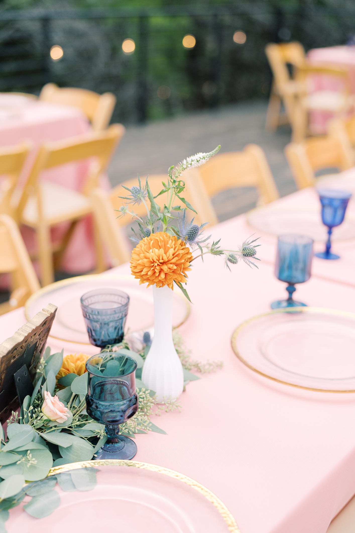 Pink, peach, navy and golden yellow make up my favorite trendy wedding color pallet - it's official! This wedding at this camp/hotel wedding venue is such a dream, you have to see! Set in the Texas hill country in Dripping Springs (with the most gorgeous view) Lucky Arrow Retreat is such a gem of a wedding venue! Click through to see Megan's BHLDN sparkly wedding dress, her perfect details, and the best party under the stars!
