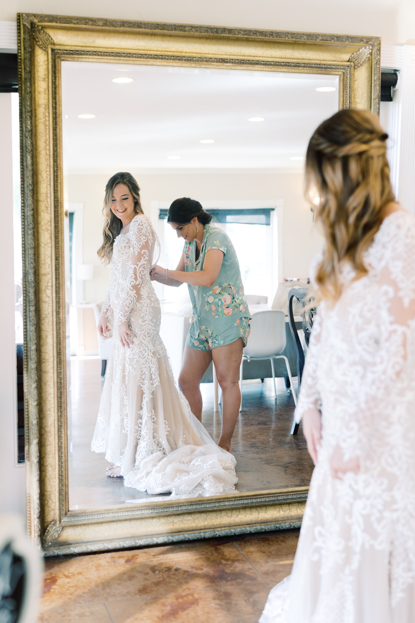 Jac's boho sheer, form fitting lace dress with gorgeous long sleeves is to die for! Their wedding day at Vintage Villas in Lakeway TX (near Austin) has the most beautiful sunset overlooking the water. You have to see for yourself! 