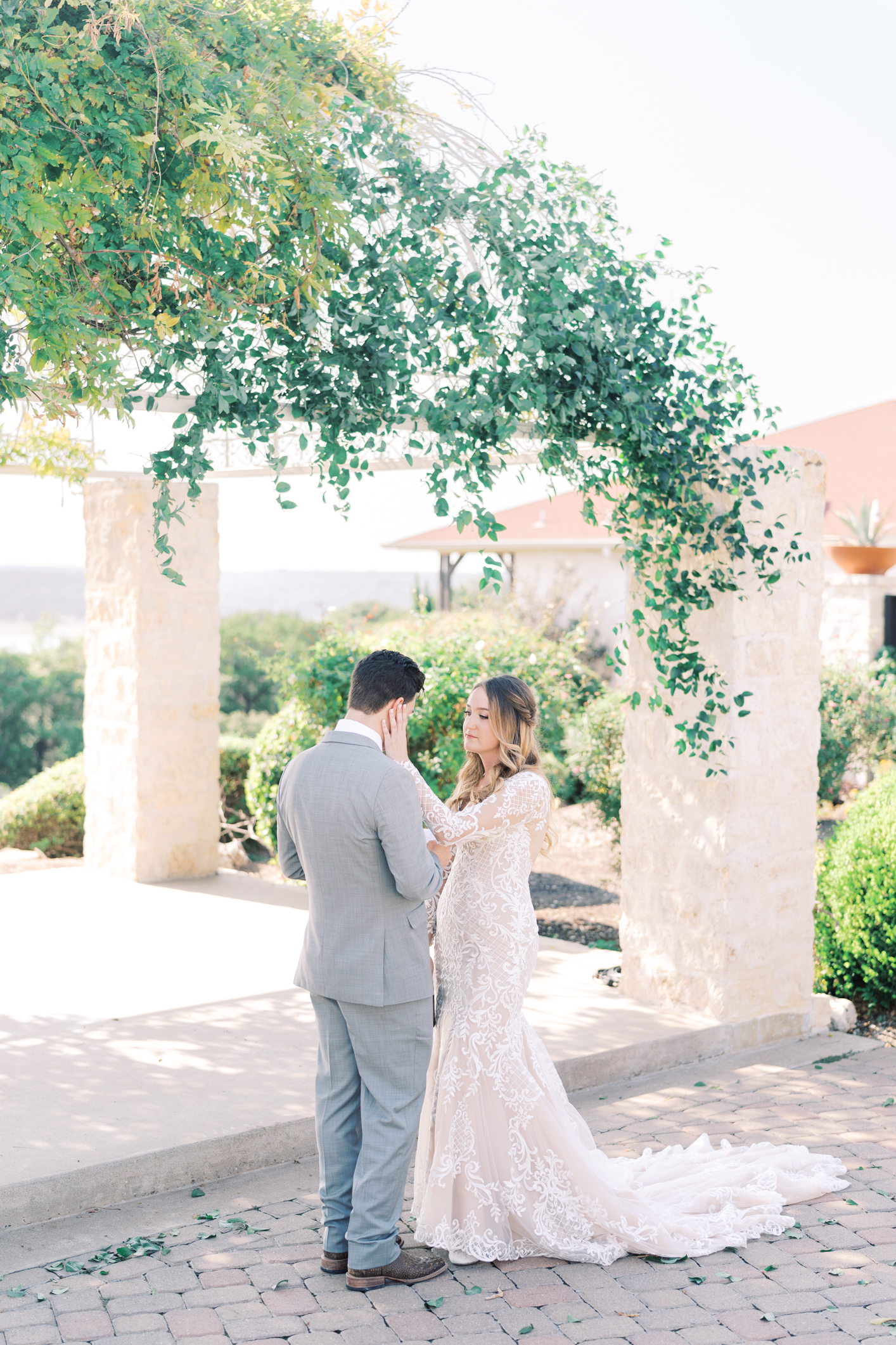 Jac's boho sheer, form fitting lace dress with gorgeous long sleeves is to die for! Their wedding day at Vintage Villas in Lakeway TX (near Austin) has the most beautiful sunset overlooking the water. You have to see for yourself! 