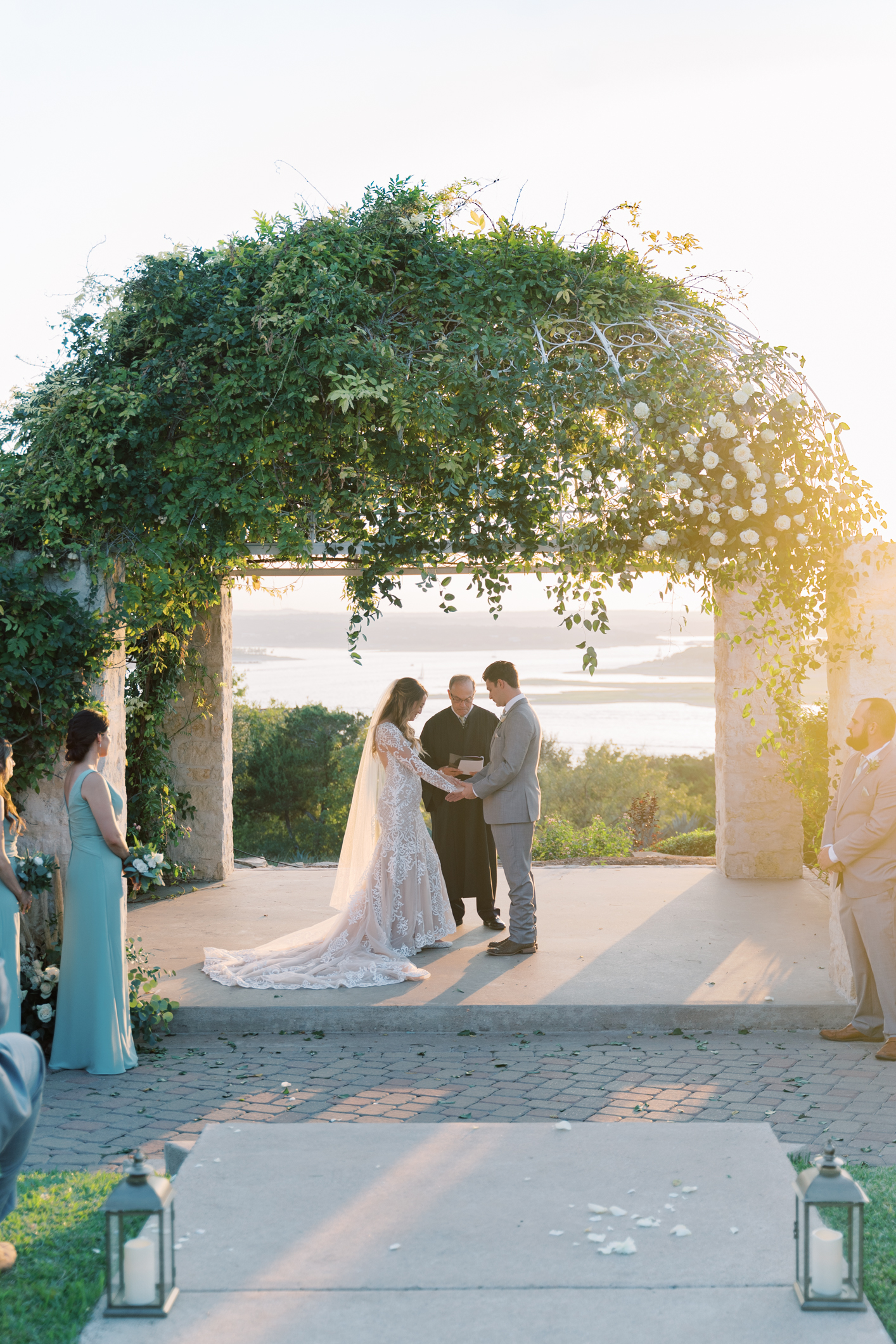 Jac's boho sheer, form fitting lace dress with gorgeous long sleeves is to die for! Their wedding day at Vintage Villas in Lakeway TX (near Austin) has the most beautiful sunset overlooking the water. You have to see for yourself! 