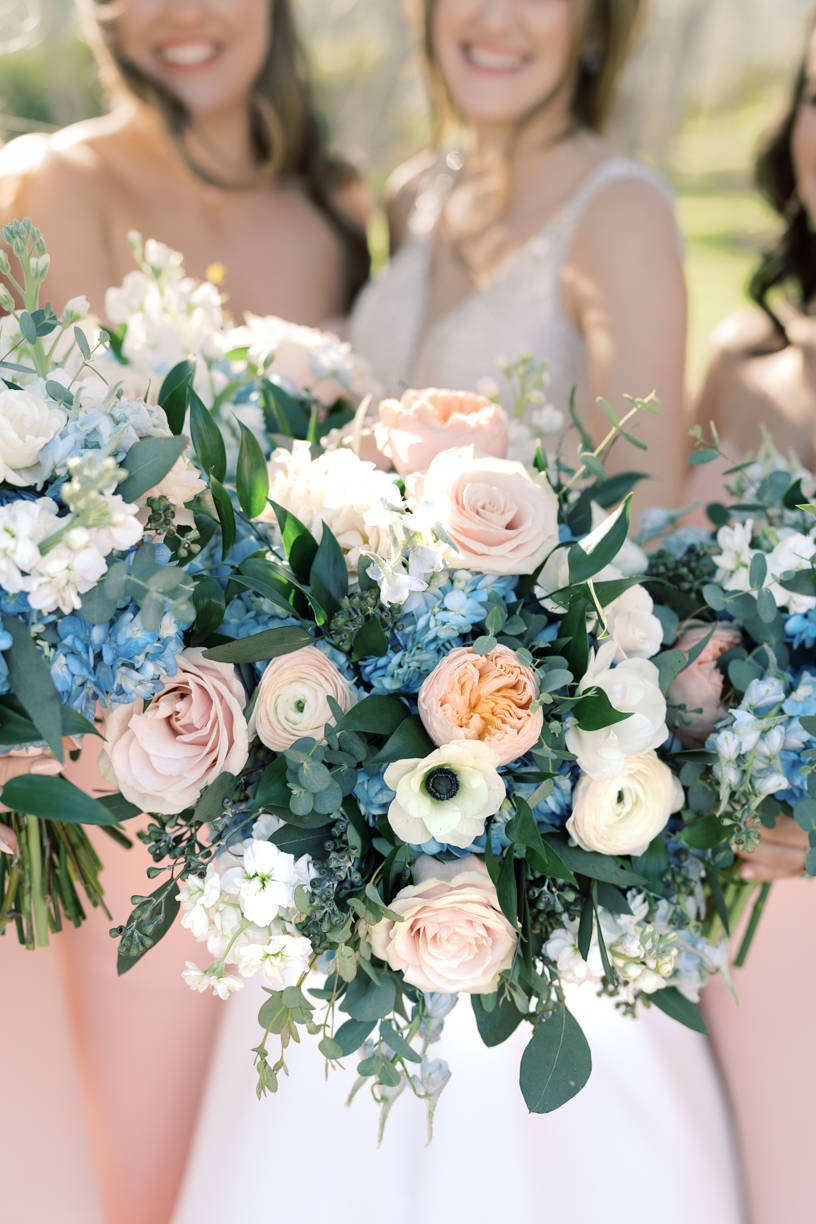 Florals by Wild Bunches florals in Dripping Springs! There are so many gorgeous portrait locations at Canyonwood Ridge! Friends, it could not have been a more gorgeous day at Amanda & Austin's Canyonwood Ridge wedding day! You have to see! 